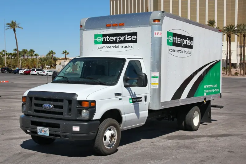 Enterprise rental truck parked.